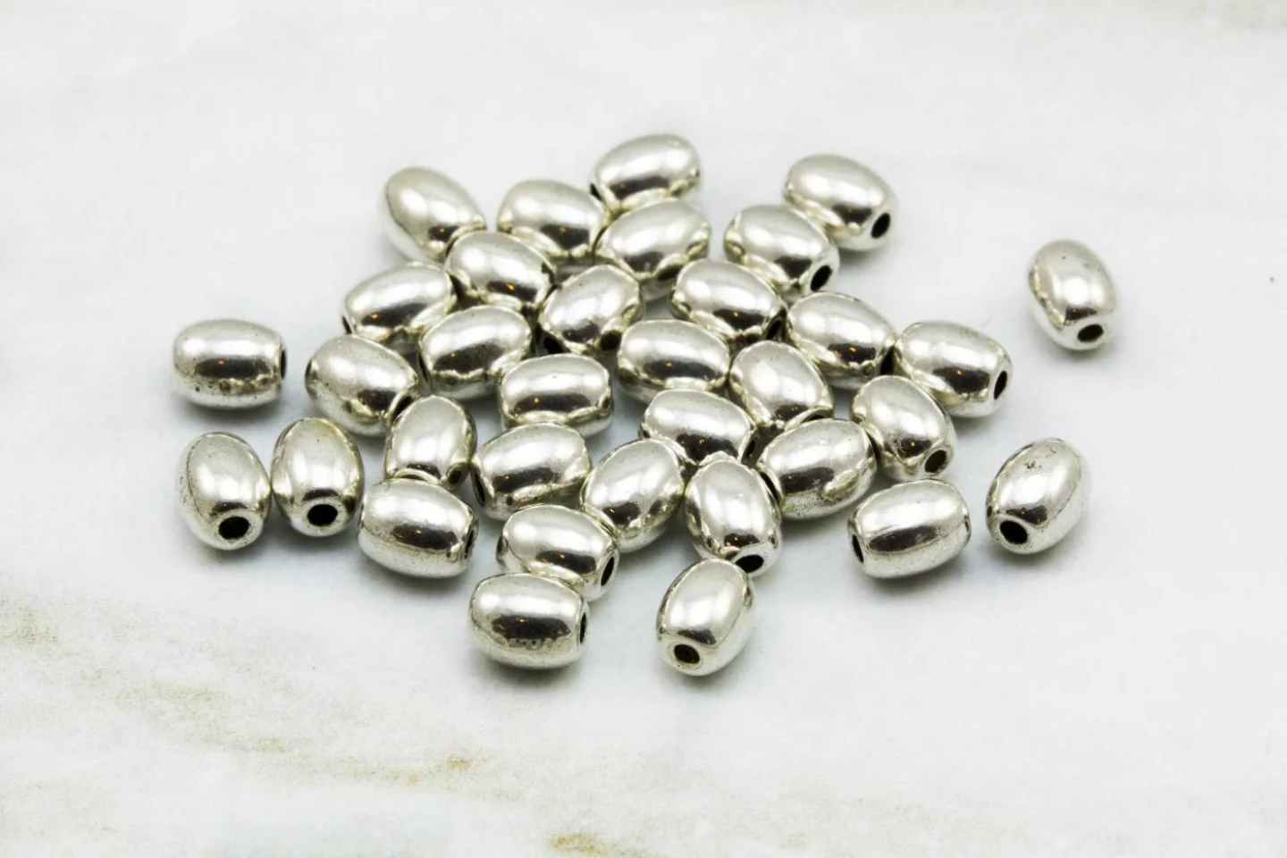mini-oval-silver-spacer-bead-findings.