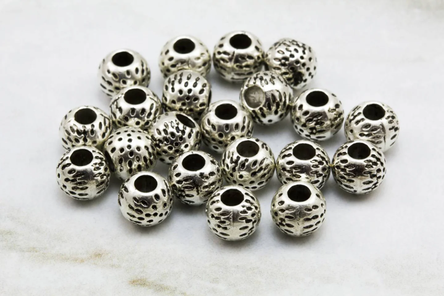 7mm-metal-round-ball-silver-spacer-beads.