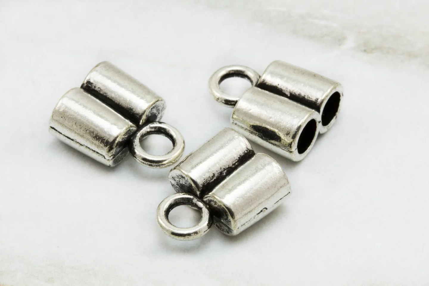 double-hole-metal-round-end-caps.