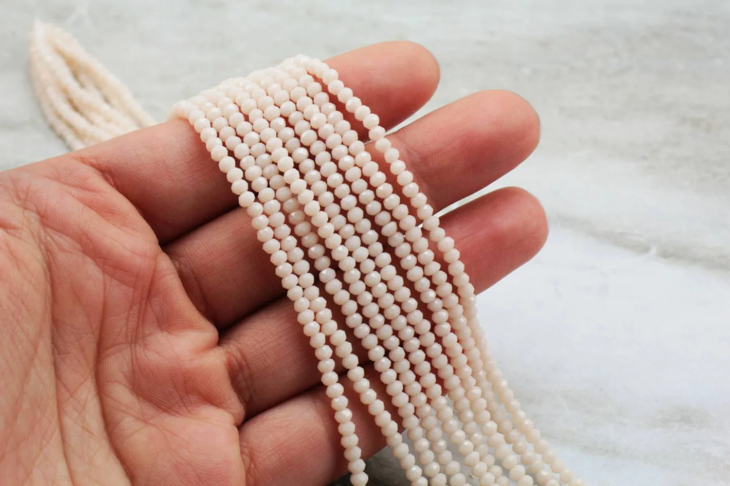 2mm-cream-faceted-crystal-glass-beads.
