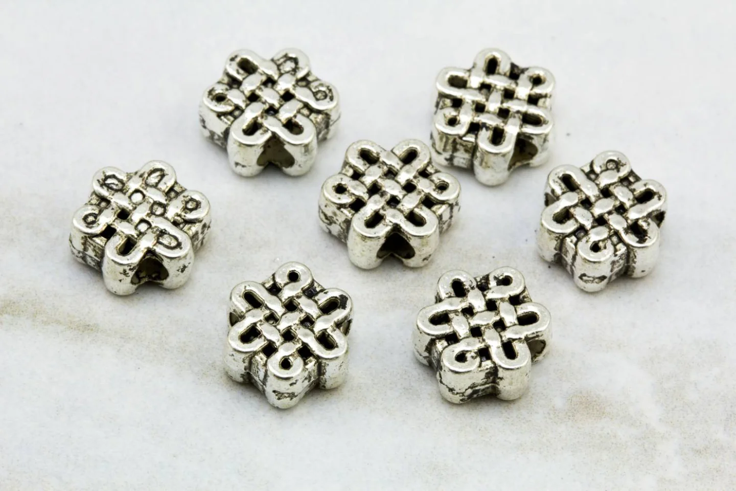 silver-metal-flat-celtic-knot-charms.